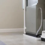 Small condensate pump draining a residential air handler